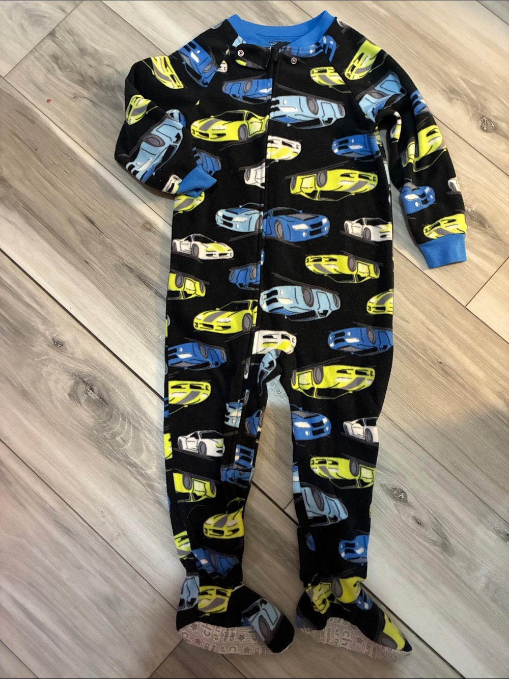 8️⃣ child of mine Dk blue Footed One-Piece Pajama with Blue and Yellow Car Print